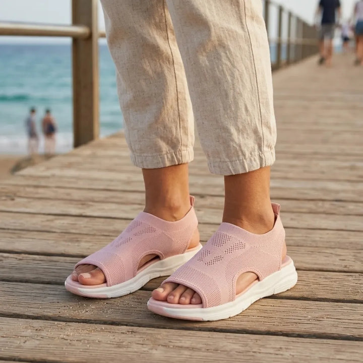 Stylish women's mesh wedge sandals, perfect for casual outings and comfort.