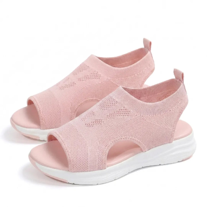 Women's breathable orthopedic sandals with a comfortable wedge heel.