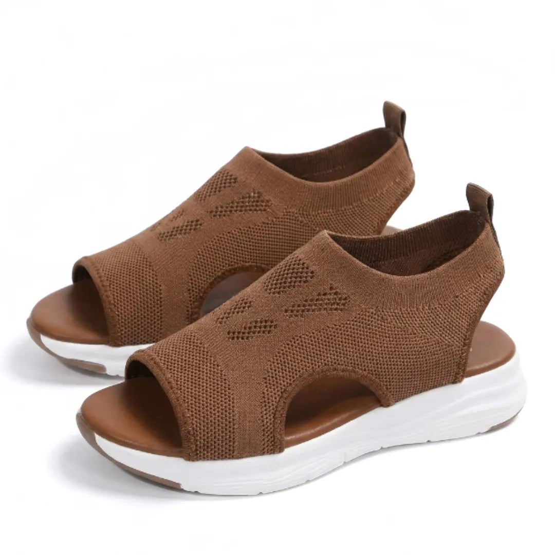 Lightweight women's comfort sandals with orthopedic arch support.