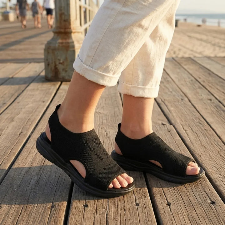 Orthopedic walking sandals for women, featuring breathable mesh & wedge heel.