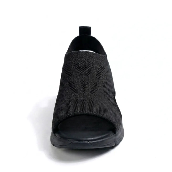 Slip-on mesh sandals for women, offering orthopedic arch support & style.