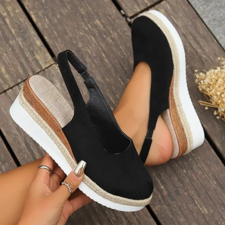 Adjustable women's orthopedic platform sandals providing excellent arch support for comfortable all-day wear.