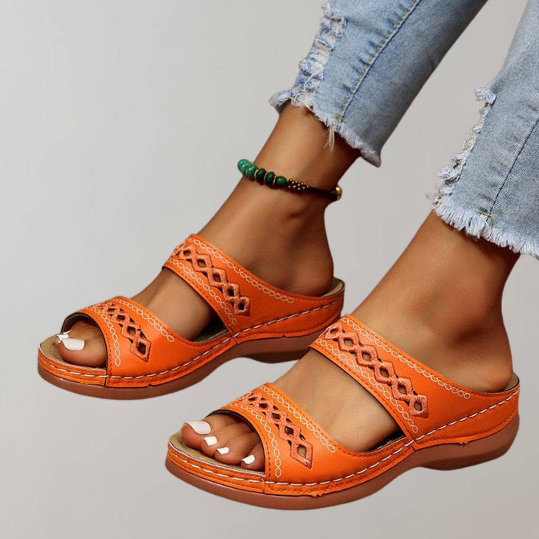 Supportive women's platform sandals featuring orthopedic design & elevated comfort for all-day wear.