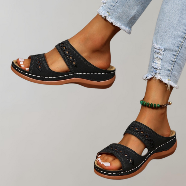 Elevated women's platform sandals offering orthopedic comfort & arch support. Stylish summer footwear.