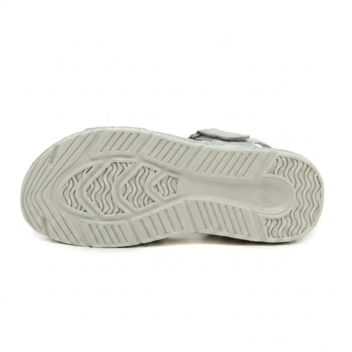 Cushioned women's sandals with adjustable strap, providing orthopedic arch support for happy feet.