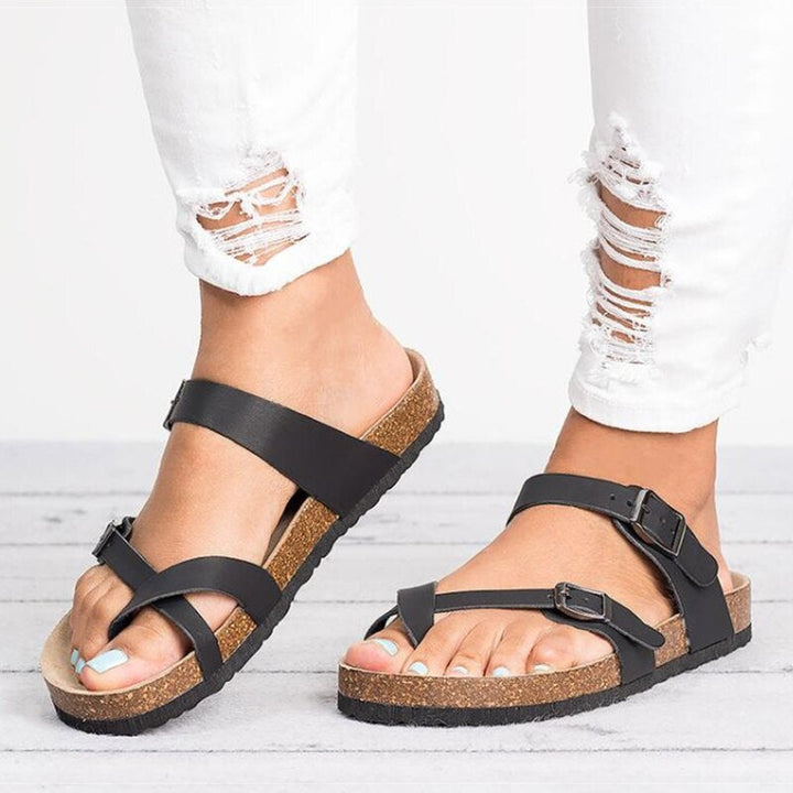 Women's orthopedic sandals with adjustable straps, arch support, and comfortable design for all-day wear.