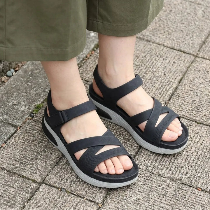 Comfortable women's walking sandals, orthopedic design with strong arch support for active summer days.