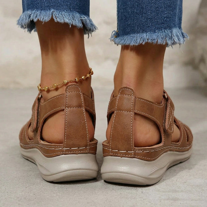 Women's supportive sandals featuring adjustable Velcro straps, perfect for daily walking & orthopedic comfort.