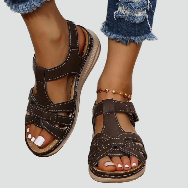 Soft, comfortable women's orthopedic sandals with adjustable Velcro straps, ideal for daily support and walking.