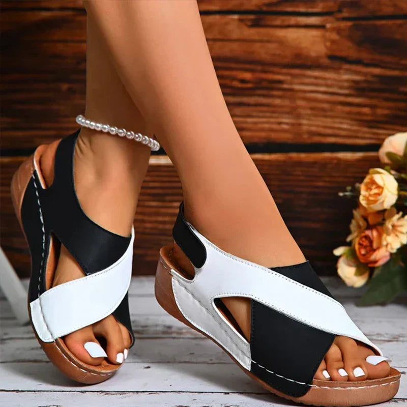 Women's orthopedic sandals with arch support for comfortable walking & daily wear. Lightweight, open-toe summer footwear.