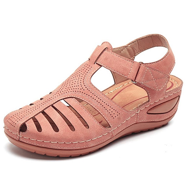 Supportive women's sandals with arch support, providing foot pain relief for active summer days.