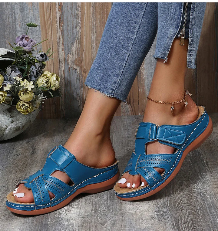 Stylish women's comfort sandals, combining orthopedic support with arch relief.