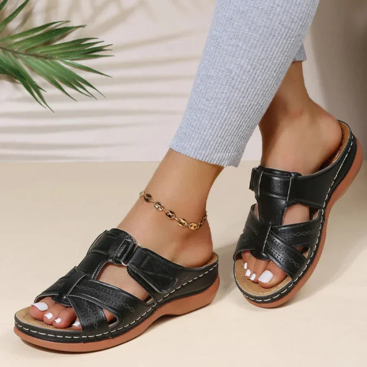 Comfortable women's walking sandals featuring ergonomic arch support for foot pain relief.