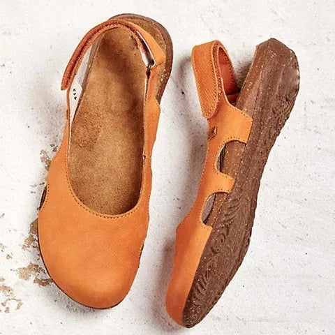 Comfort footwear: Women's orthopedic sandals with adjustable straps & cushioned arch support for all-day wear.