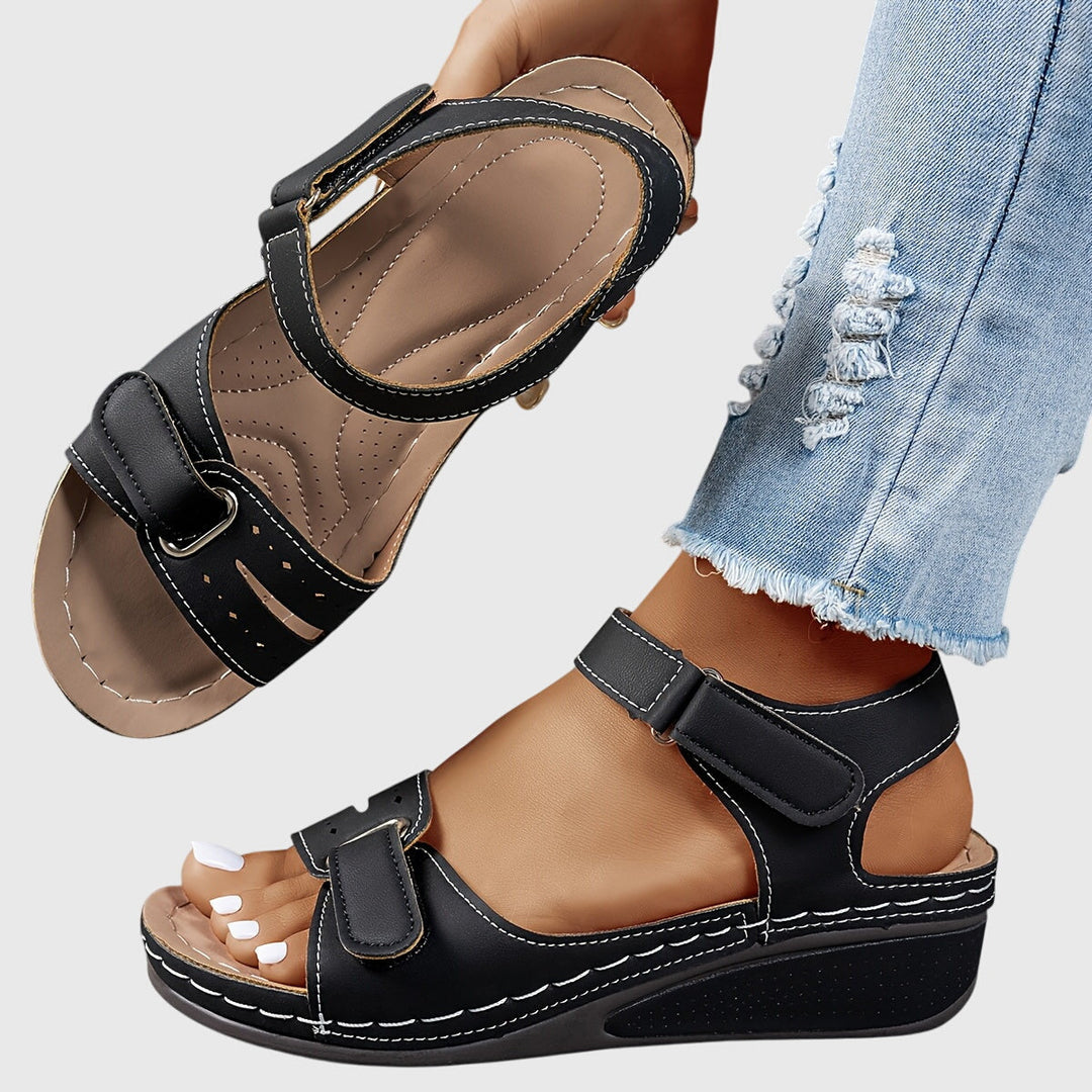Stylish women's orthopedic sandals featuring crystal embellishments, designed for arch support & ultimate comfort.