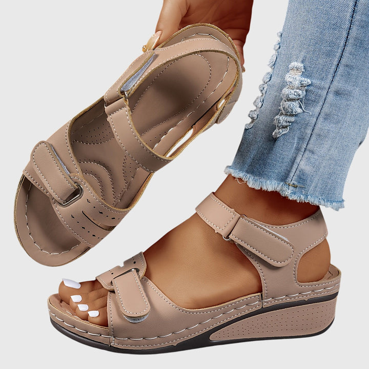 Durable women's orthopedic walking sandals, embellished with crystals, offering non-slip grip and support.