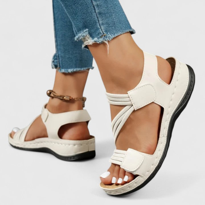 Women's summer sandals providing exceptional arch support and pain relief for active lifestyles.