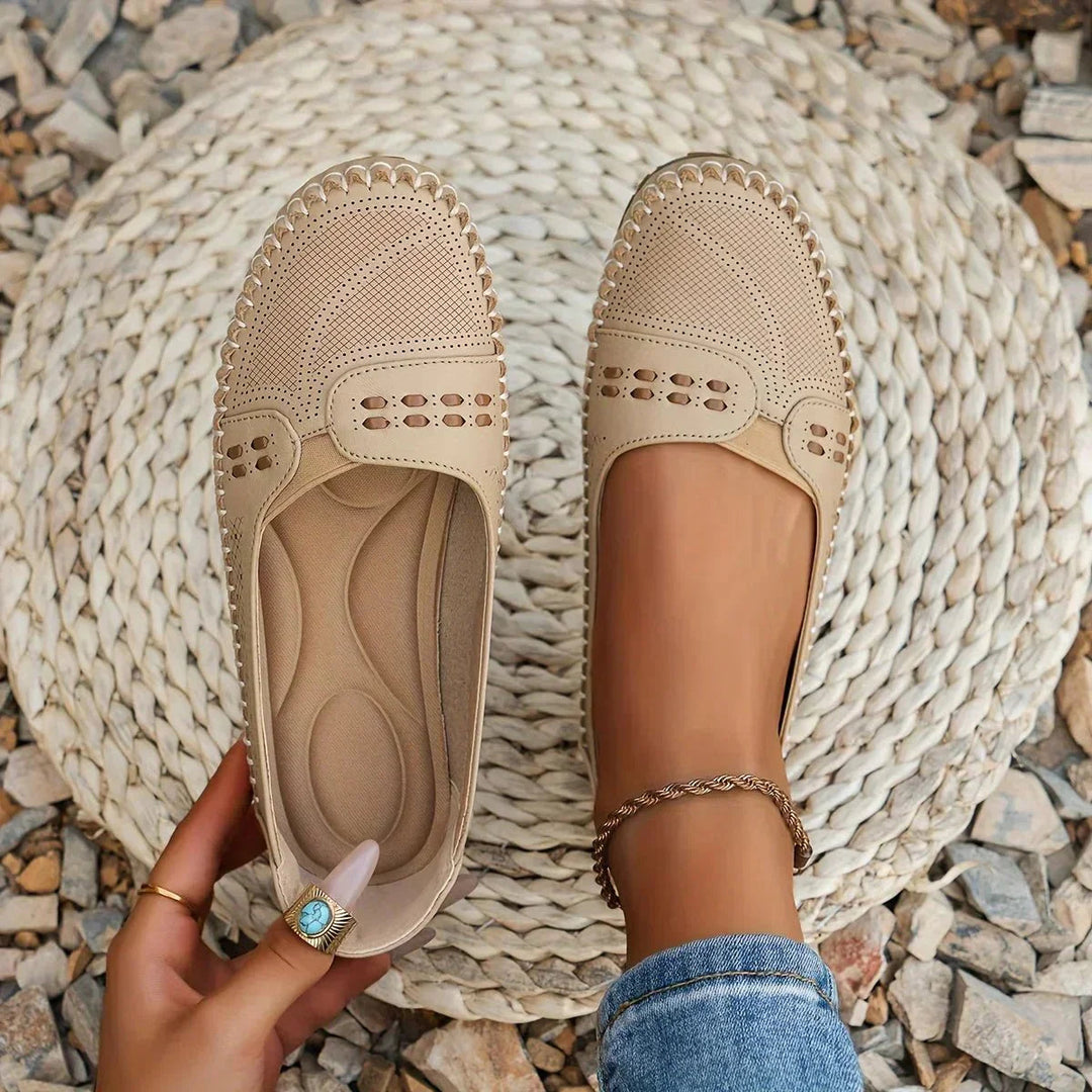 Women's orthopedic slip-on loafers, perforated design for casual everyday comfort.