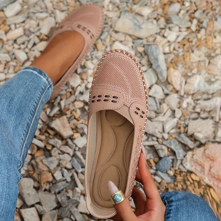 Everyday comfort with these women's orthopedic perforated slip-on loafers.