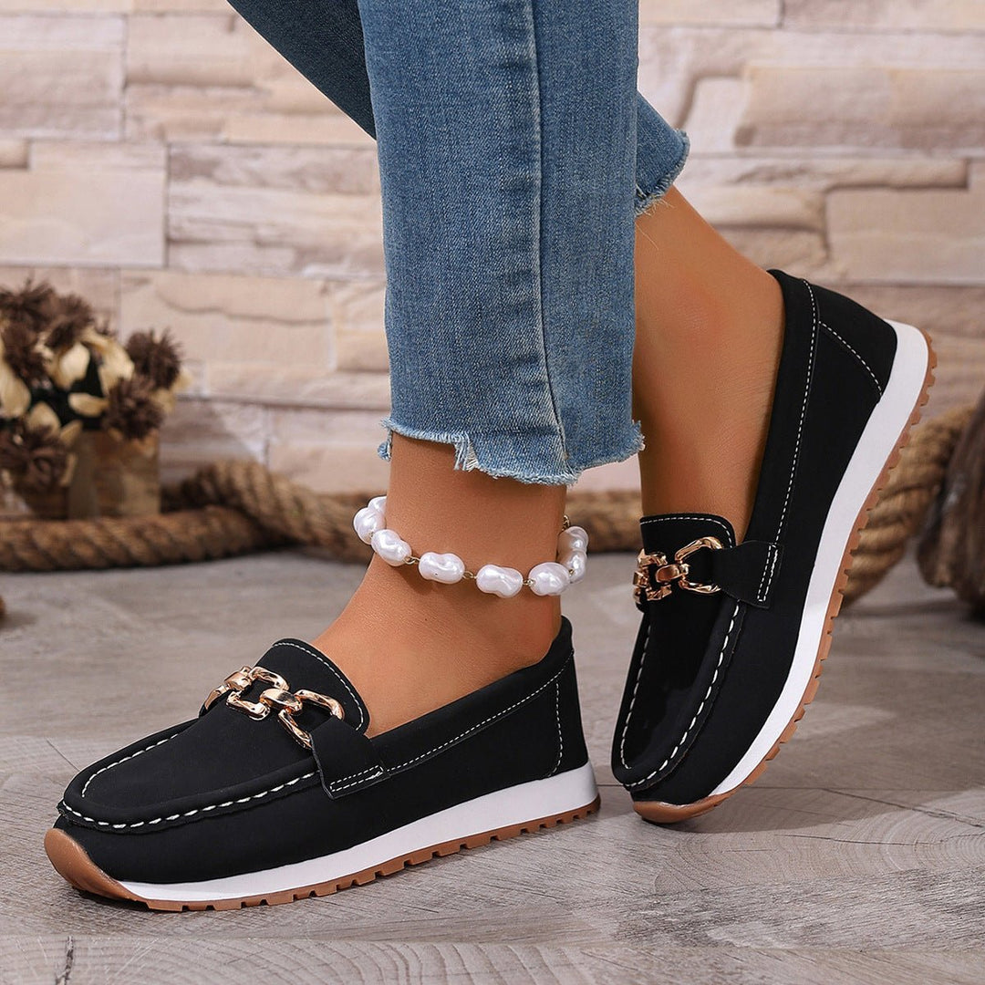 Modern women's orthopedic slip-on loafers with advanced arch support & a cushioned sole.