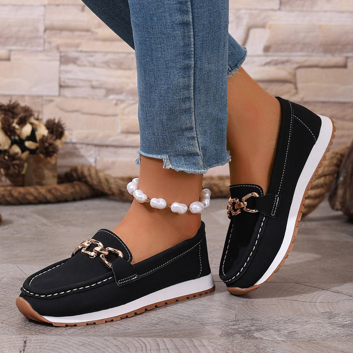 Modern women's orthopedic slip-on loafers with advanced arch support & a cushioned sole.