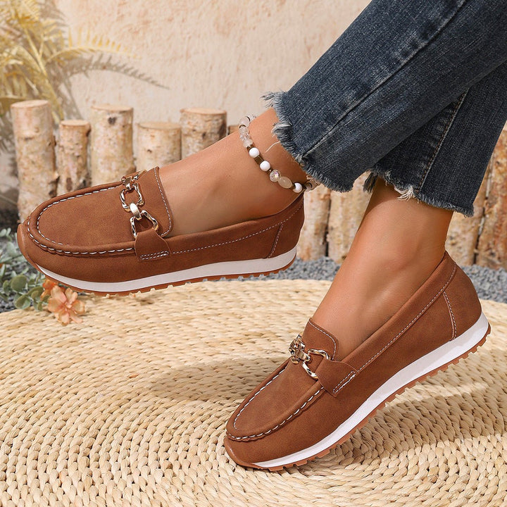Women's orthopedic slip-on loafers with wide toe box, arch support & extra cushioning.