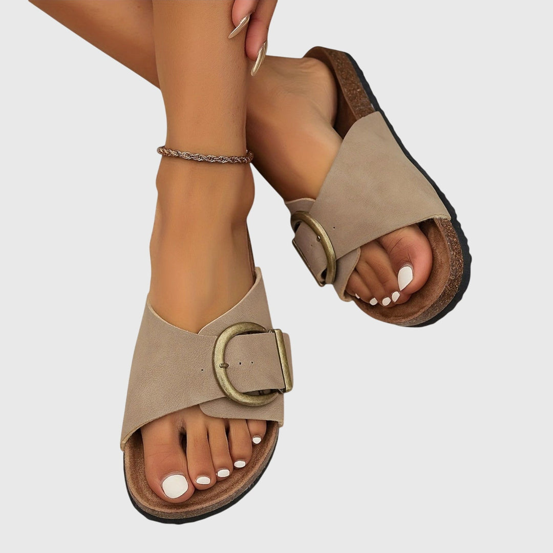 Casual women's flat sandals offering superior arch support. Perfect for summer, beachwear, and daily walks.