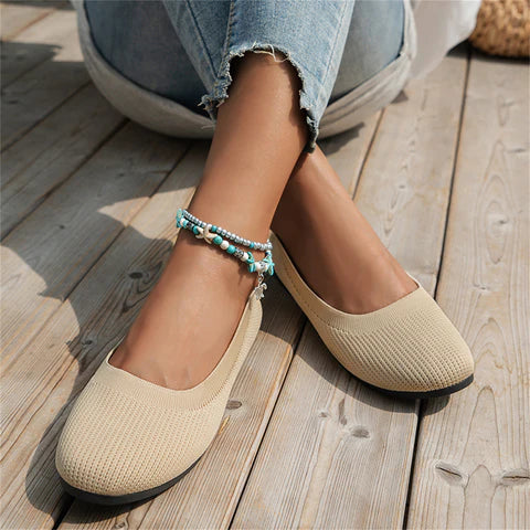 Women's orthopedic slip-on shoes with memory foam and arch support for comfortable everyday walking.