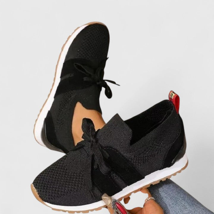 Women's orthopedic slip-on walking sneakers, designed for all-day comfort with supportive, breathable mesh.