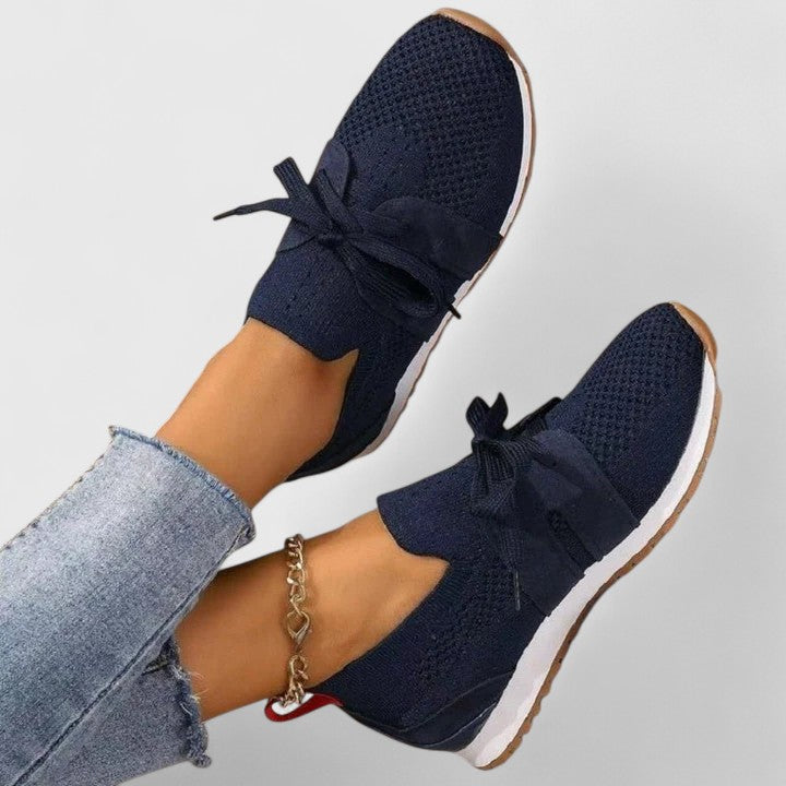 Breathable women's orthopedic slip-on walking shoes with a comfortable, non-slip sole for active women.