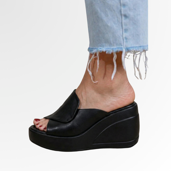 Women's orthopedic slip-on wedge sandals in beige, offering comfort and arch support for summer casual wear.
