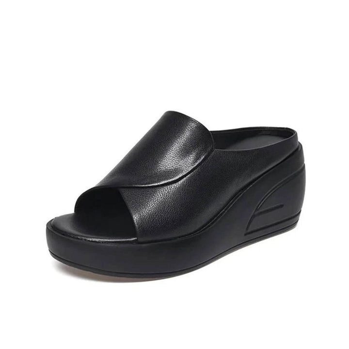 Stylish women's slip-on wedge sandals with orthopedic support for comfortable all-day casual wear.