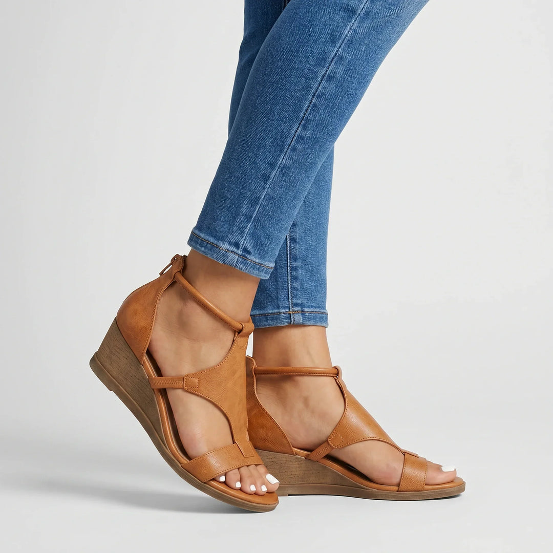 Women's orthopedic strappy summer sandals with arch support, adjustable straps, and comfortable open-toe design.
