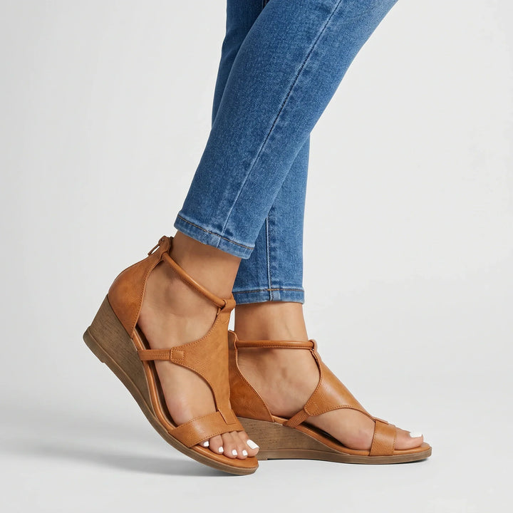 Women's orthopedic strappy summer sandals with arch support, adjustable straps, and comfortable open-toe design.