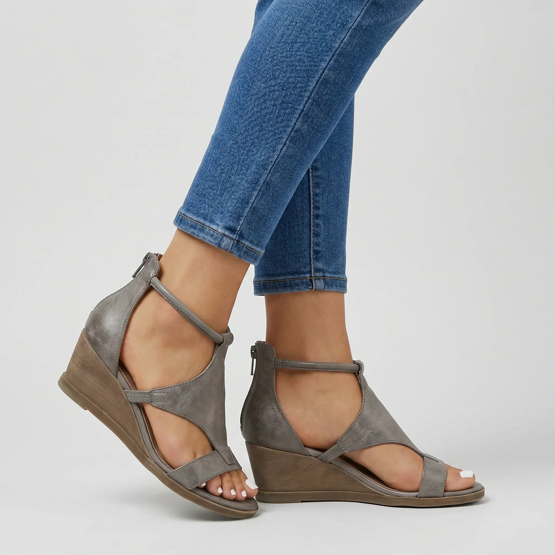 Stylish women's strappy summer sandals offering orthopedic comfort, arch support, and adjustable fit for casual wear.