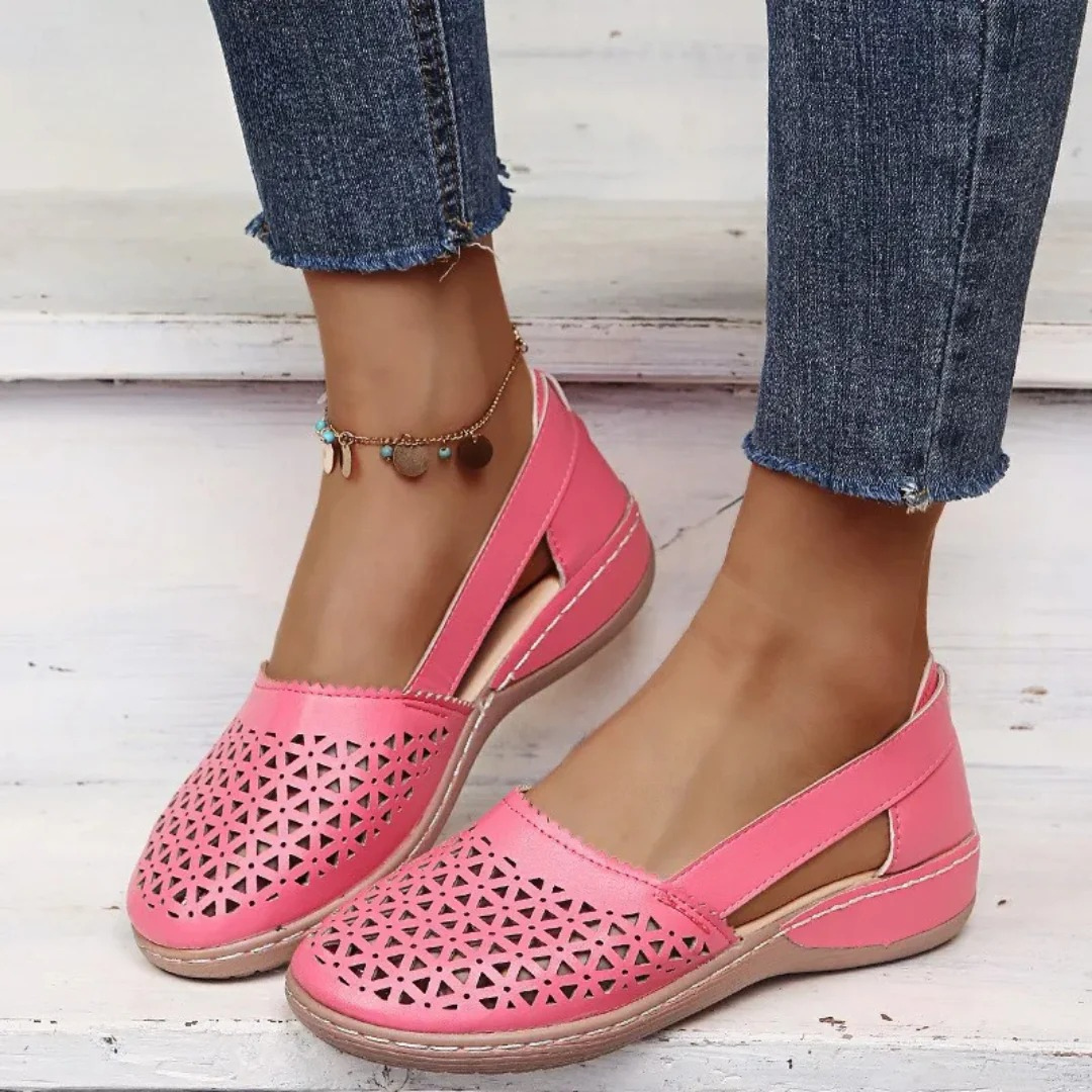 Women's comfortable walking shoes with orthopedic support, breathable cutout design for summer.