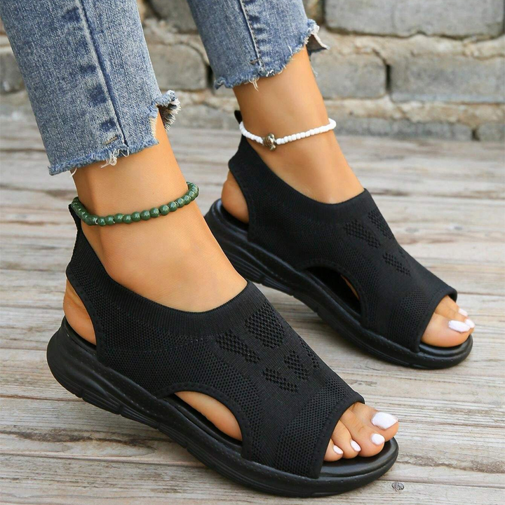 Women's comfortable walking sandals, open toe design, with arch support.