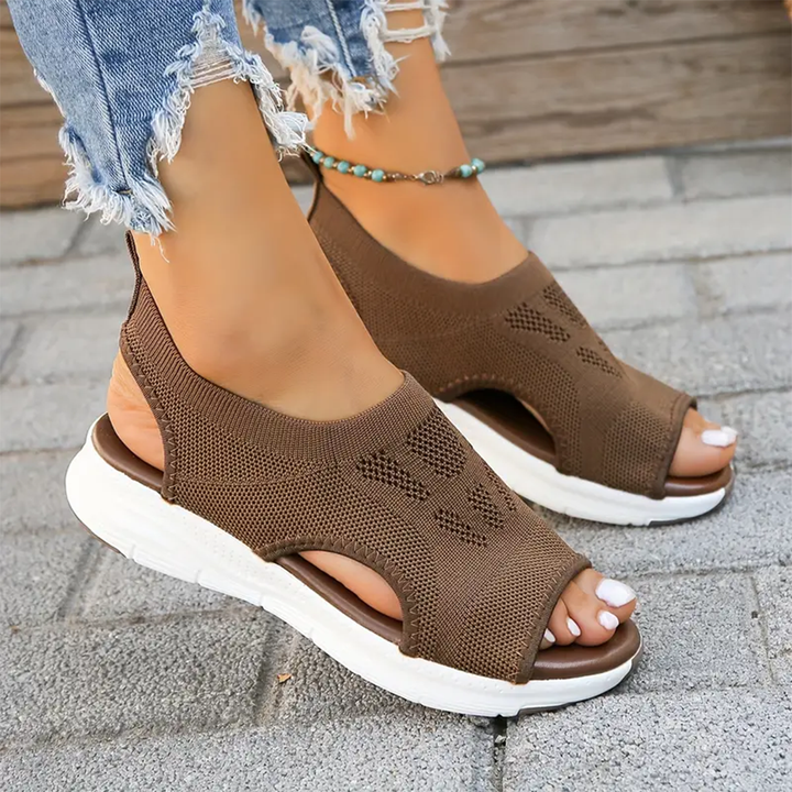 Women's summer comfort sandals, adjustable straps, cushioned for all-day wear.