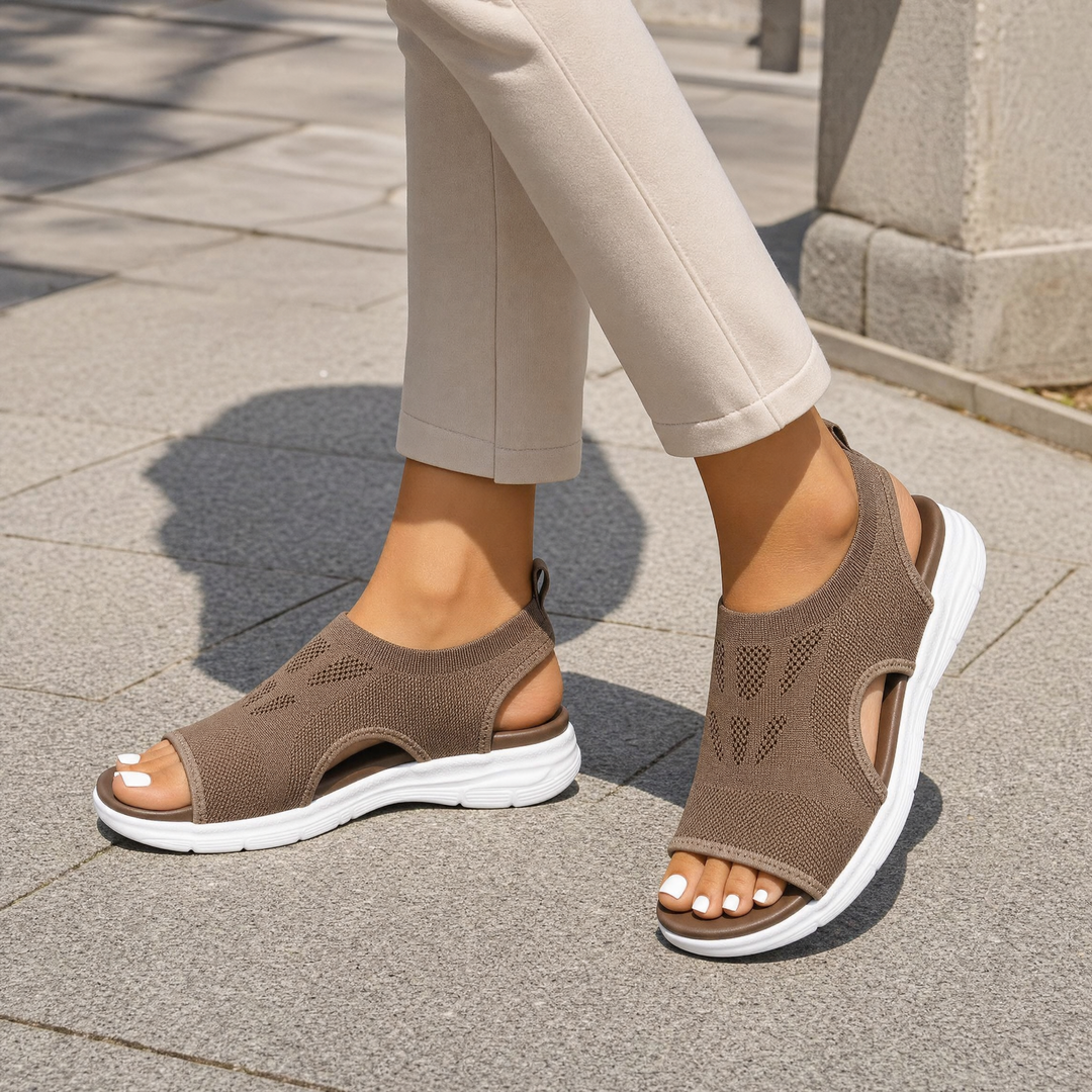 Comfortable women's orthopedic sandals with strong arch support for daily walking.