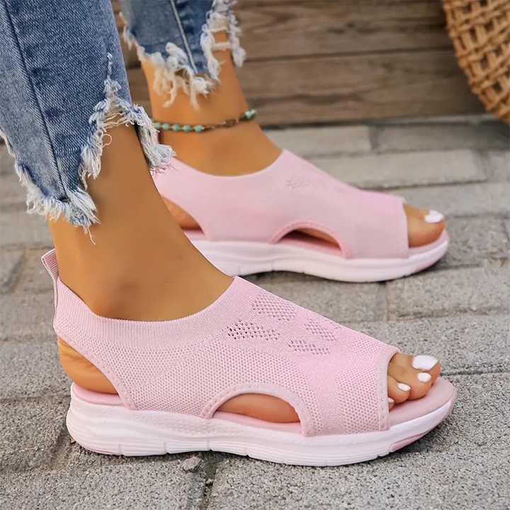 Non-slip women's walking sandals, adjustable straps, cushioned for comfort.