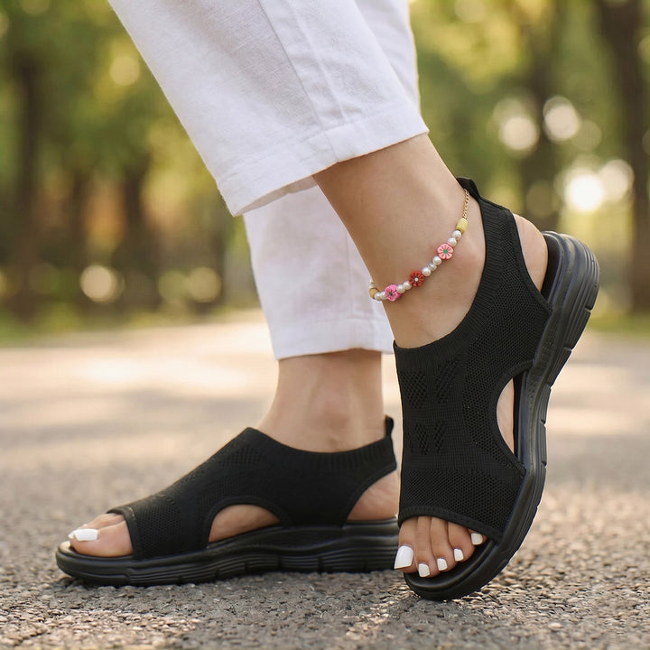 Women's orthopedic sandals providing essential foot support & cushioning for active comfort.