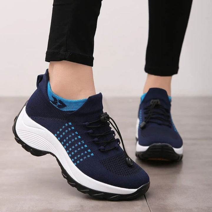 Supportive women's orthopedic shoes, promoting better posture and all-day comfort for walking.