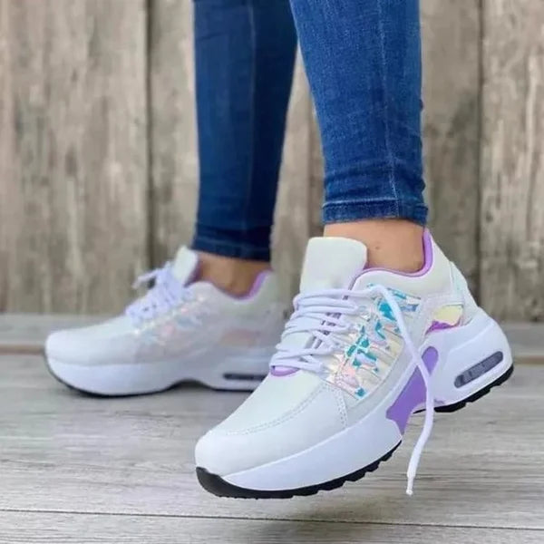 Orthopedic footwear for women, providing foot support, arch comfort & pain relief in a walking sneaker.