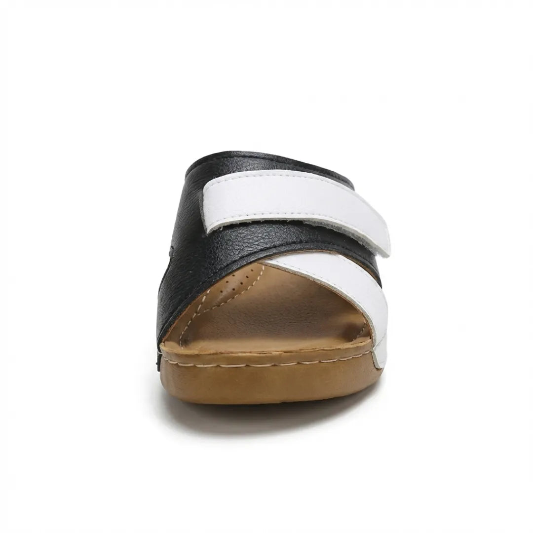 Casual summer footwear: Women's comfortable wedge sandals with a supportive design.