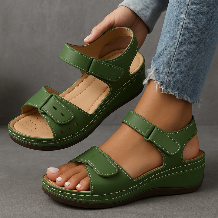 Women's orthopedic wedge sandals for stylish comfort. Features arch & heel support with adjustable straps.