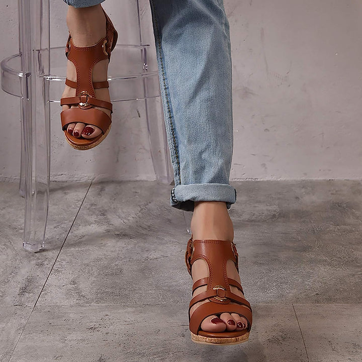 Top view of women's stylish orthopedic wedge sandals, emphasizing arch support for everyday comfort.