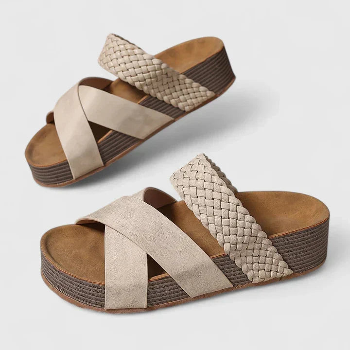Women's orthopedic wedge sandals with woven crossover straps, offering arch support & comfort for summer.