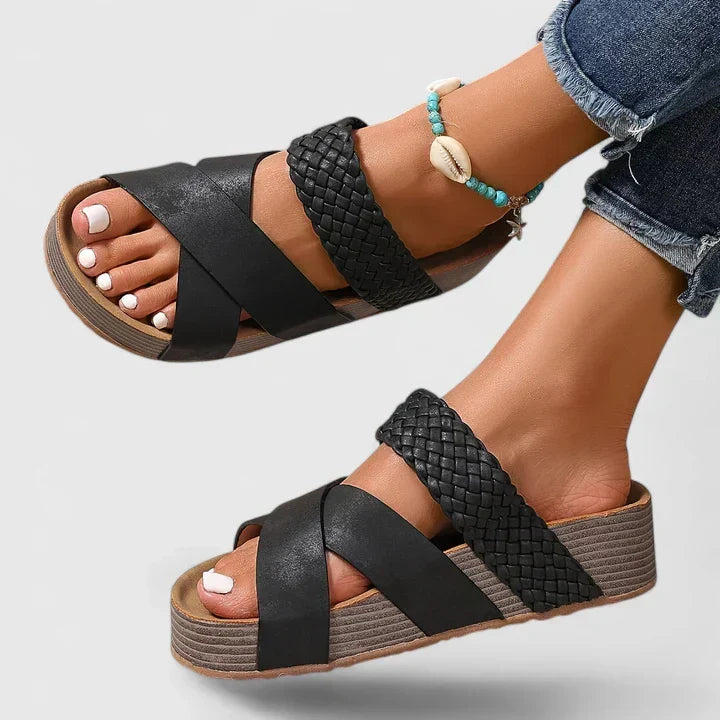 Stylish women's platform wedge sandals with braided straps, perfect slip-on resort wear for summer.