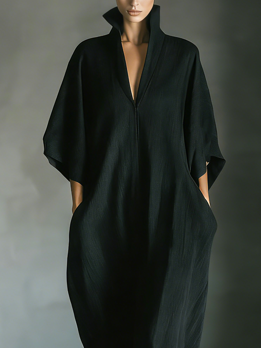 Comfortable women's oversized maxi dress with flowy kimono sleeves & practical side pockets.