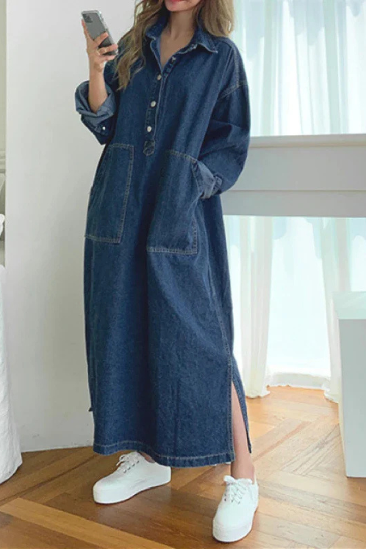 Stylish women's oversized blue maxi shirt dress with pockets, ideal for spring/fall. Button-front, relaxed fit.